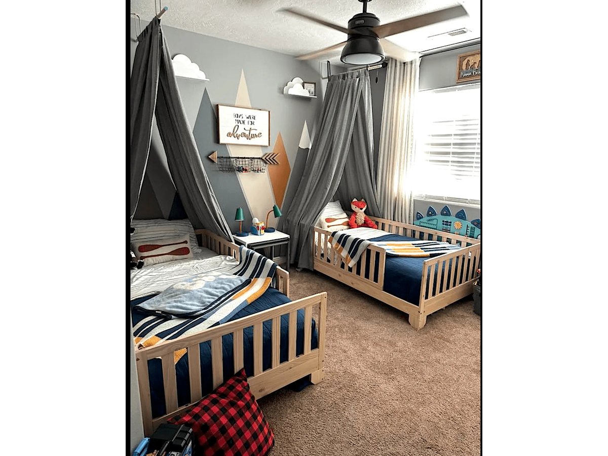 Two Luca natural twin floor beds with rails in a shared children’s bedroom #color_natural