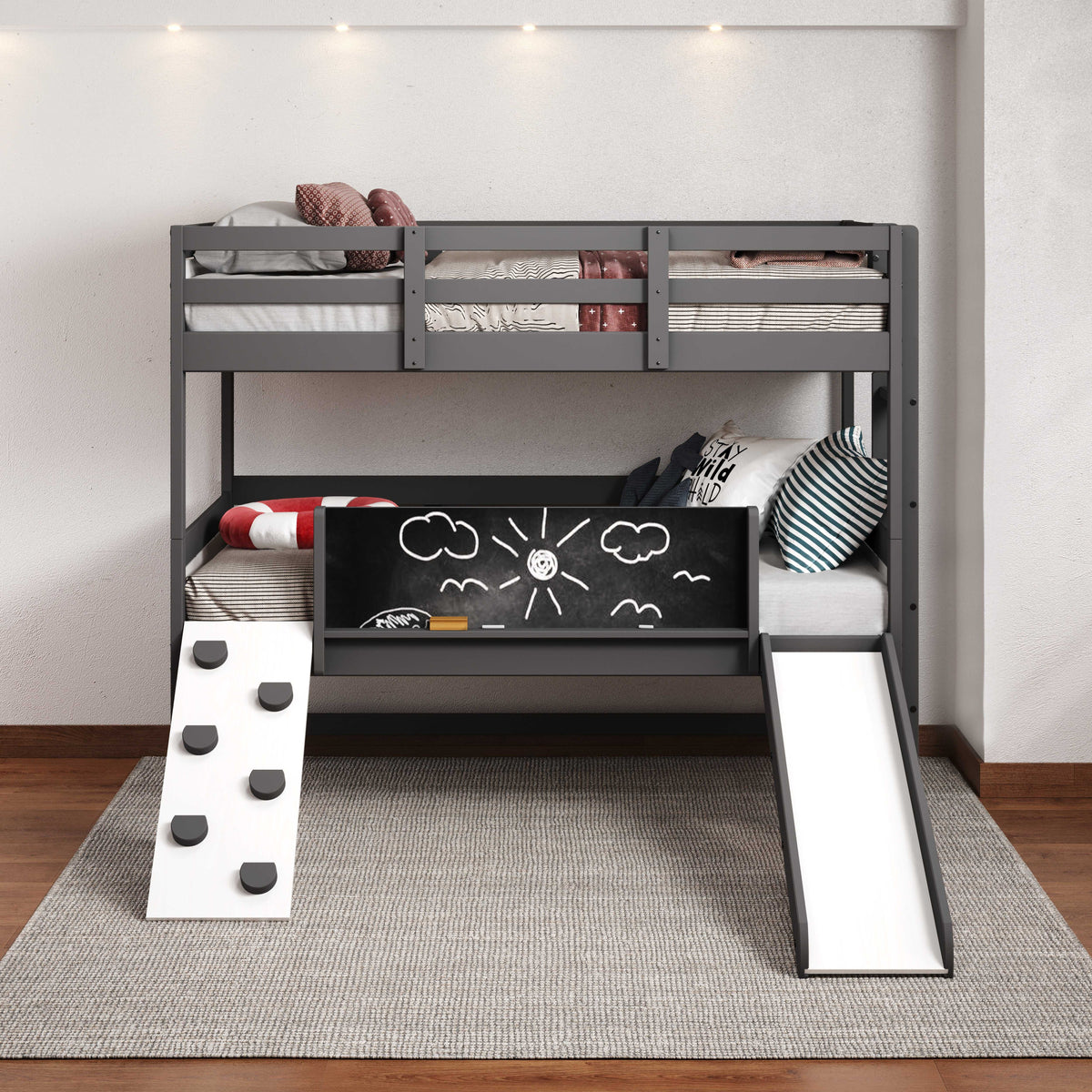 Ophelia Bunk Bed with Slide & Climbing Wall in dark gray finish, featuring a chalkboard panel and twin mattresses, ideal for kids' bedrooms.