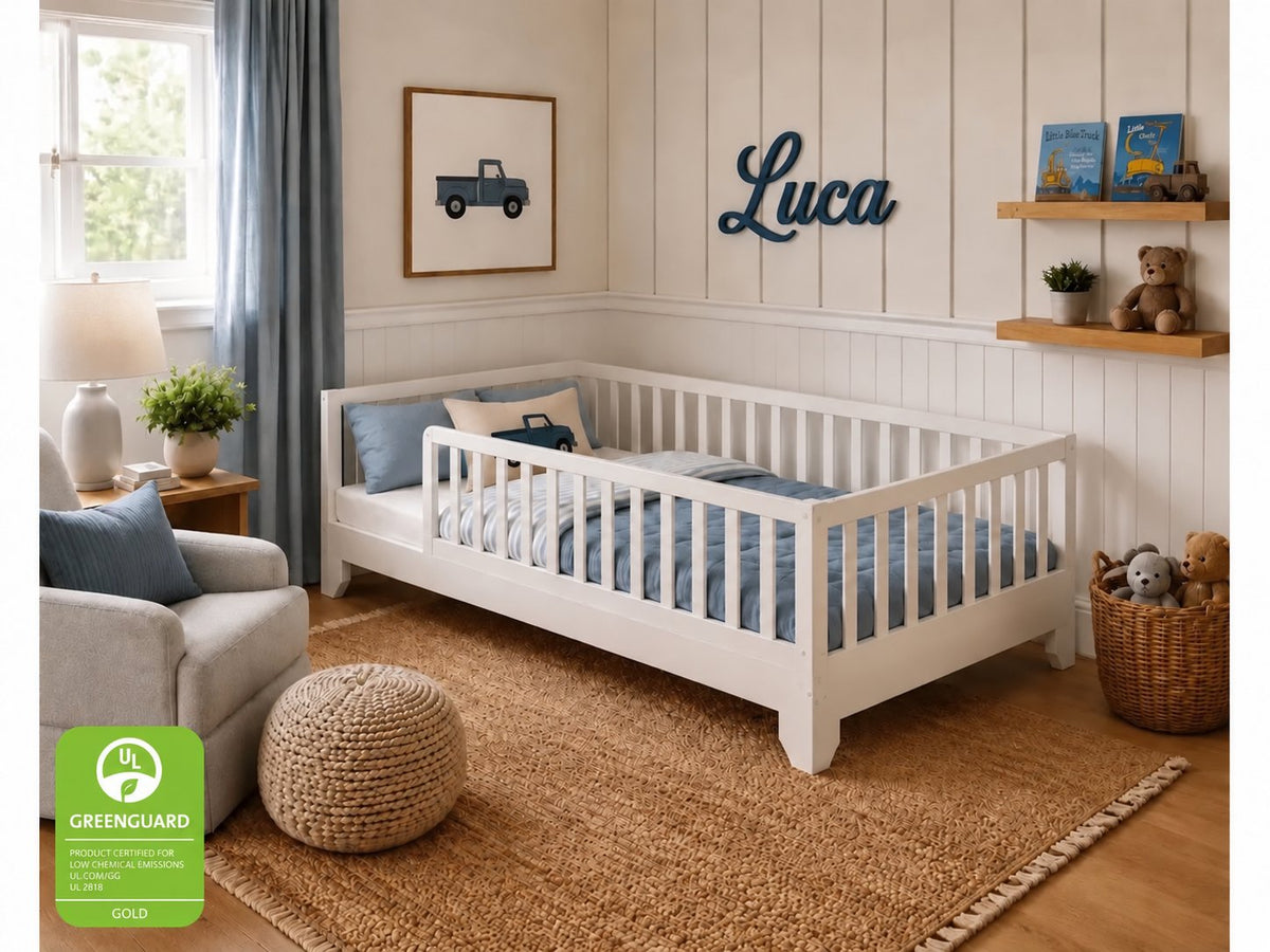 Luca white twin toddler floor bed with rails and blue bedding in a modern bedroom #color_white