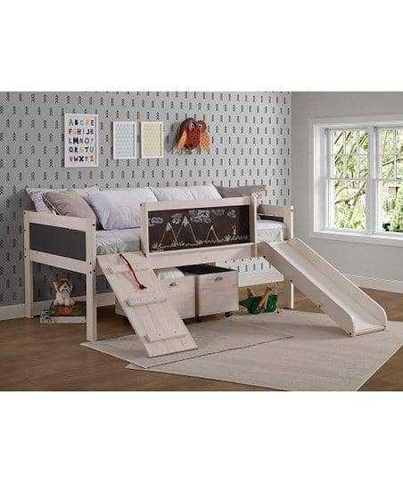 Oliver Low Loft Bed with Slide and chalkboard panel, shown with ladder, slide, and two storage drawers in a modern children's bedroom.
