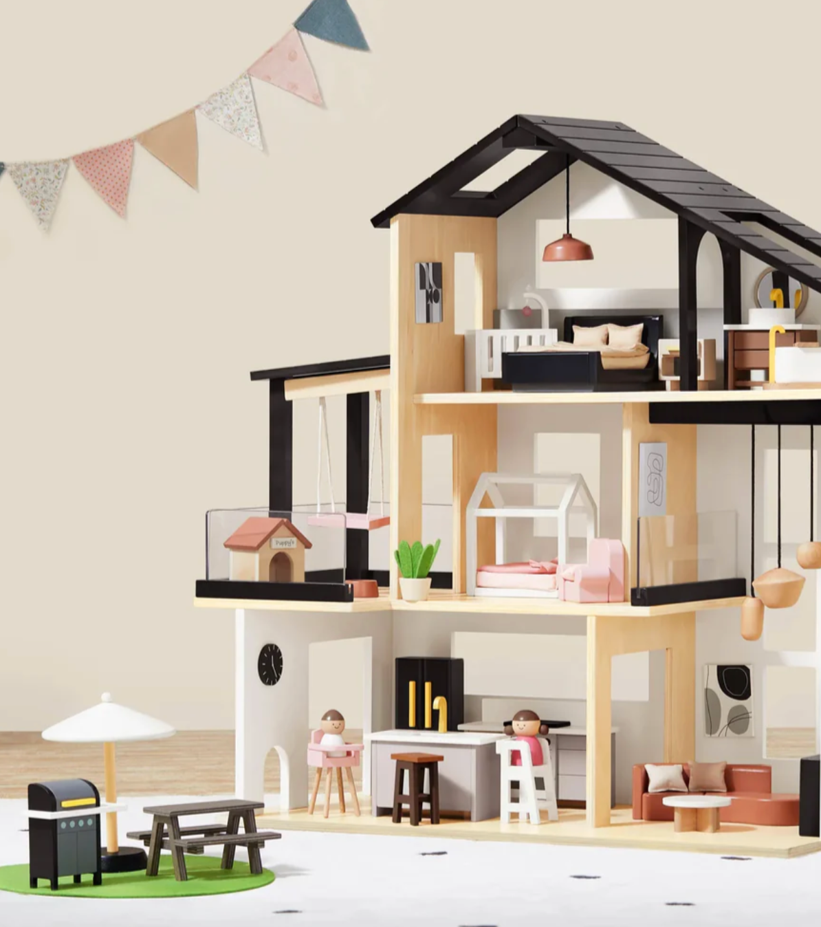 Montessori-inspired wooden dollhouse with miniature furniture and decor