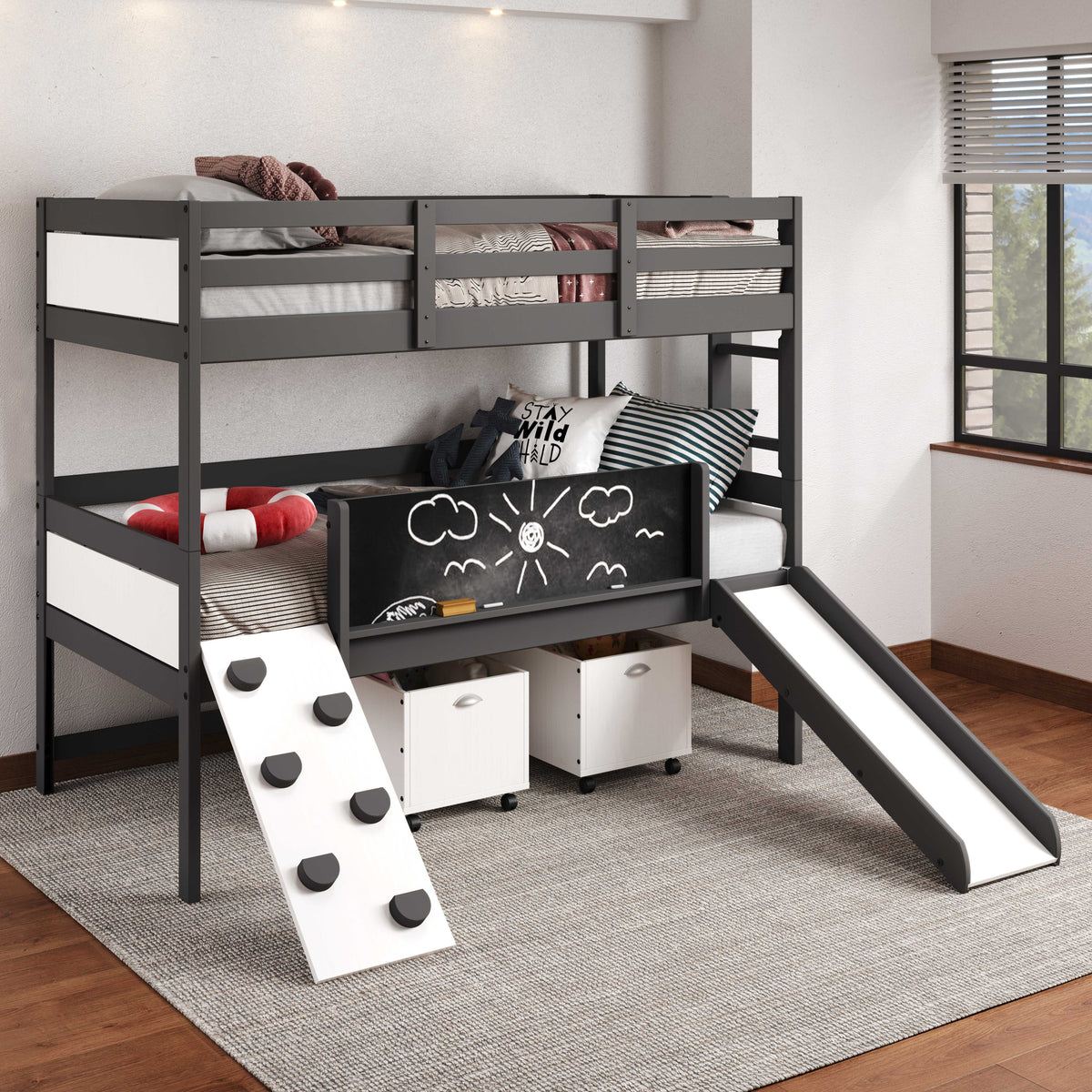 Kids twin Ophelia Bunk Bed with Slide & Climbing Wall in gray, styled with bedding and storage bins, perfect for fun and functional bedrooms.