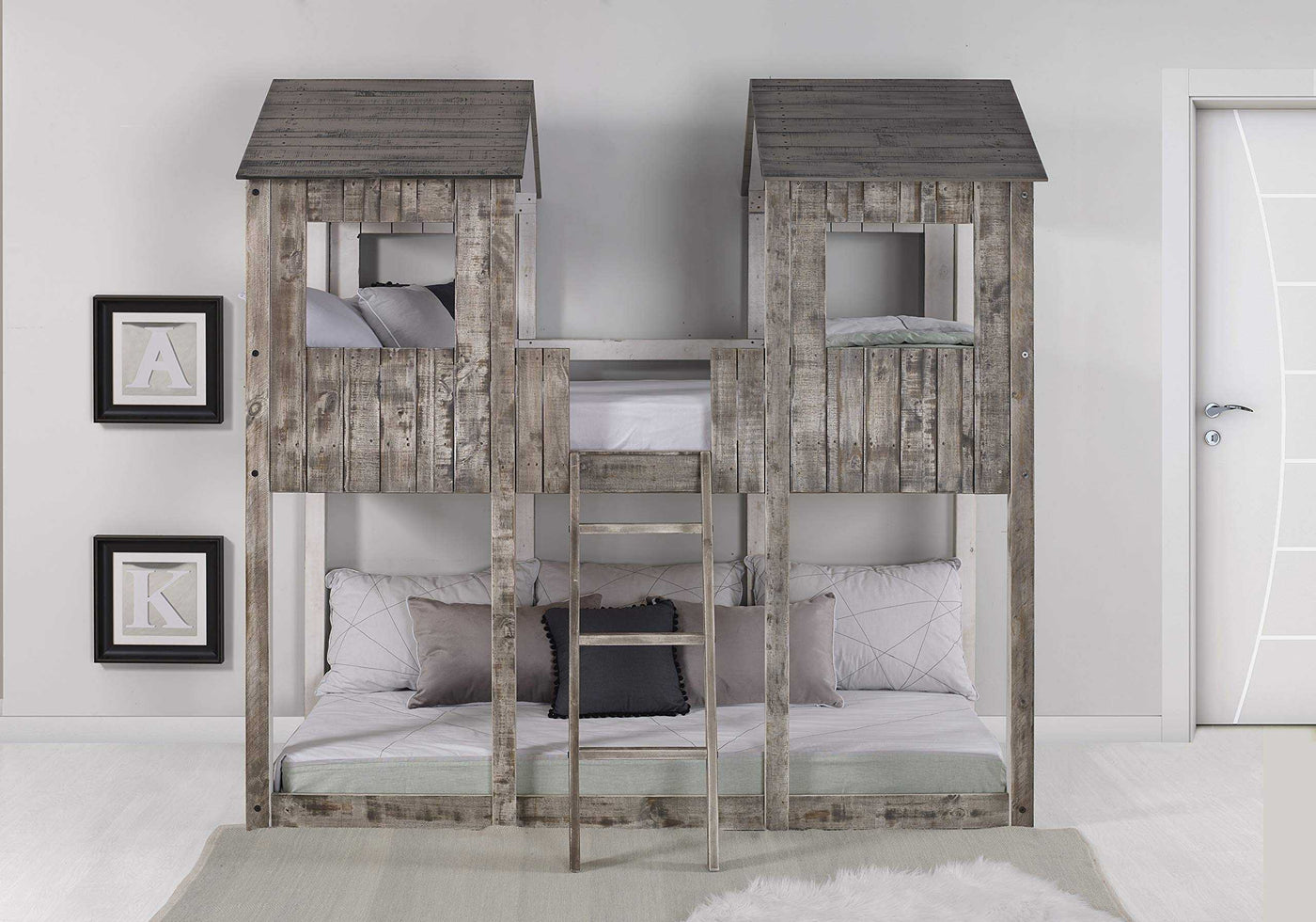 Rustic twin Colton Fort Bunk Bed in solid wood, featuring two tower-style frames and ladder access, perfect for shared children's rooms.