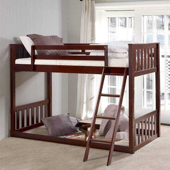 Jace Floor Bunk Bed in dark wood finish with top twin bed and open floor-level space, ideal for kids' rooms and space-saving design.